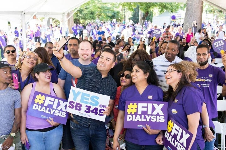 Dialysis center workers and patients rallied Tuesday behind California state Sen. Ricardo Lara's bill to set minimum staffing levels.