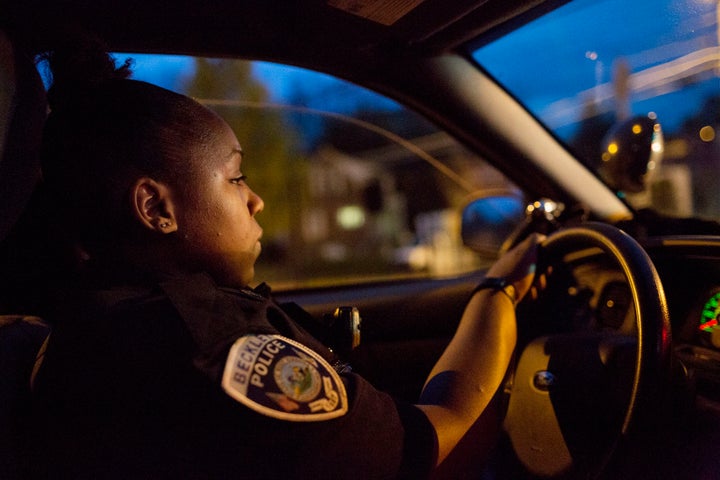 Beckley police officer Charlene Diggs in her patrol car. 