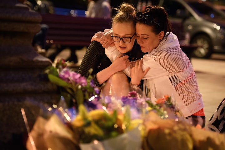 An evening vigil took place outside Manchester's Town Hall.