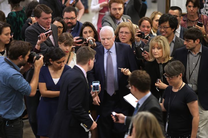 Sen. John McCain (R-Ariz.) talks to reporters instead of throwing them to the ground.