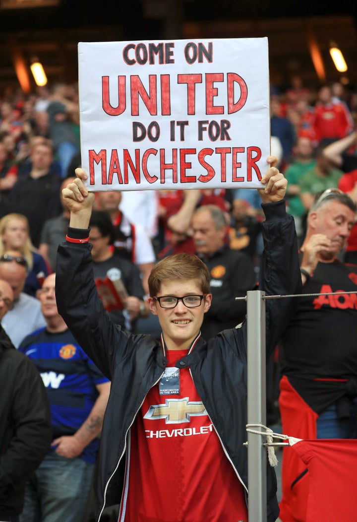 A fan holds a banner during Wednesday night's game