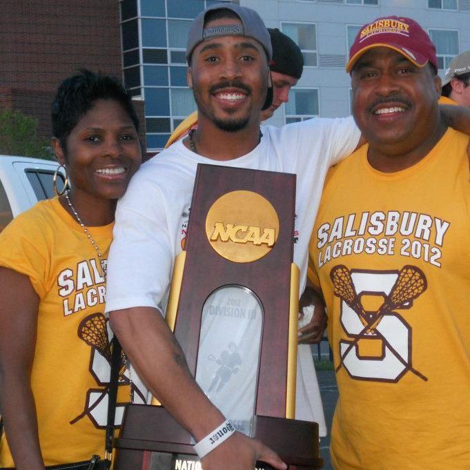 Lantz Carter (center), Charm City Youth Lacrosse boys director, pictured with his father, Lloyd, after winning the 2012 NCAA Division III national lacrosse championship. The older Carter played on Morgan State University’s lacrosse team in the late 1970s, early 1980s.