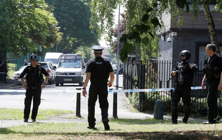 Police activity at a cordon in the Hulme area of Manchester.