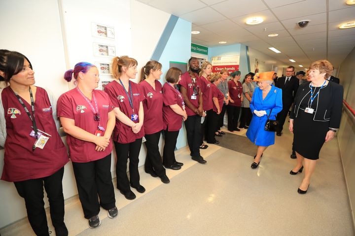 Escorted by Kathy Cowell (right) Chairman of the Central Manchester University Hospital, Queen Elizabeth II visits the Royal Manchester Children's Hospital to meet victims of the terror attack in the city.