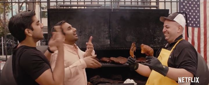 Harris Gani and Aziz Ansari at the pork fest on "Master of None."