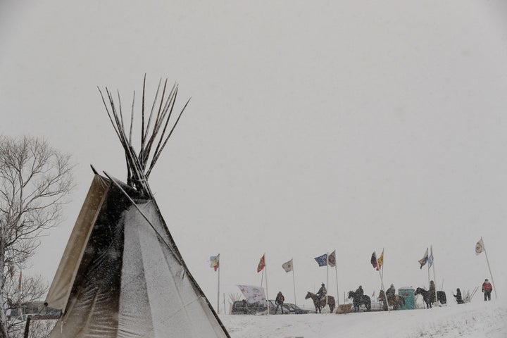  Environmental destruction is a negative externality to be isolated and managed. Here, Native Americans at Standing Rock defend sacred land from a proposed oil pipeline. e