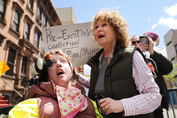 Alba Somoza, who has cerebral palsy, attends a rally with her mother and dozens of health care activists in front of a Harlem charter school before the expected visit of House Speaker Paul Ryan. The activists are critical of Ryan and the passage of the GOP healthcare bill in the House.