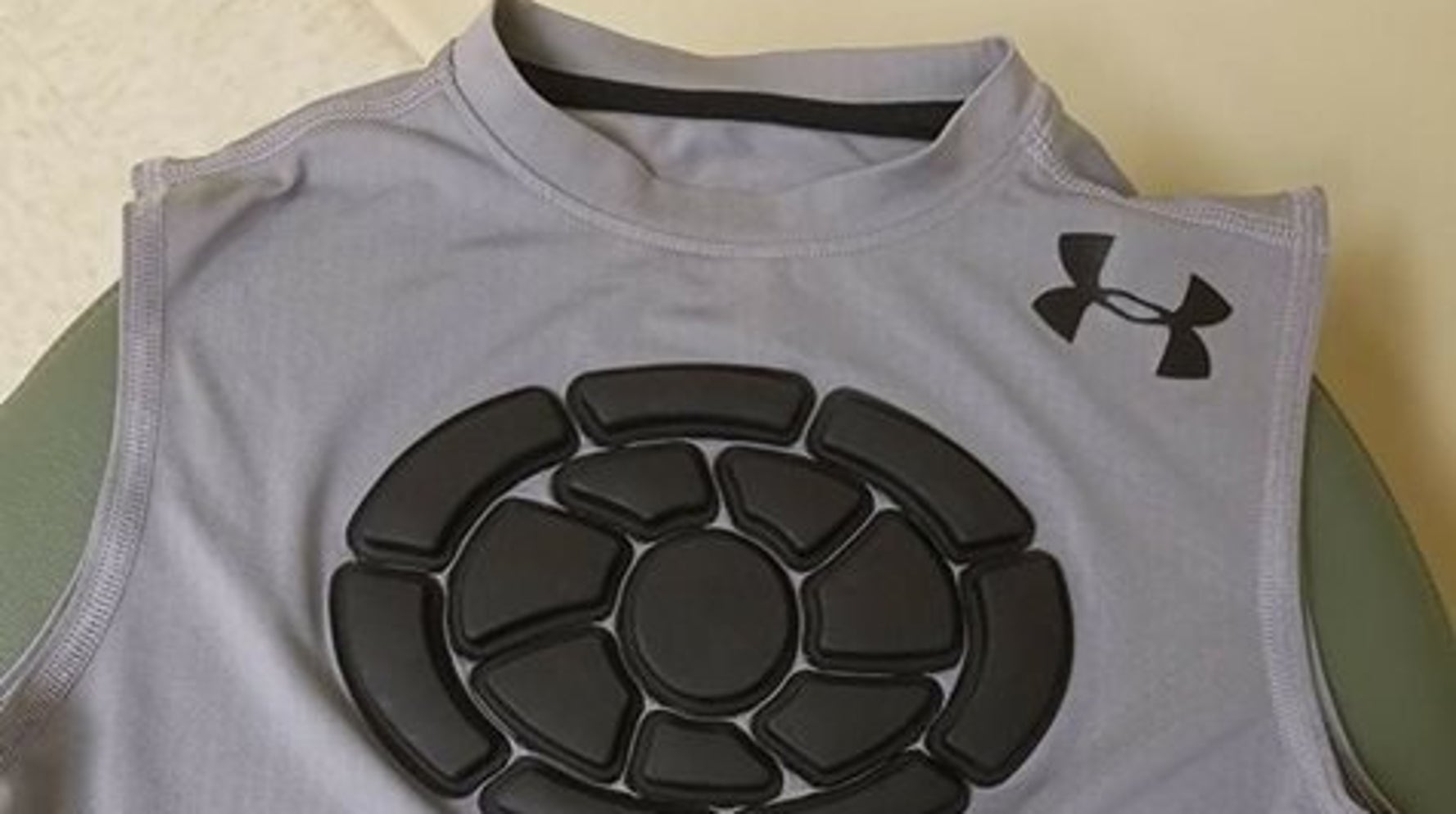 Under armour chest protector shirt best sale