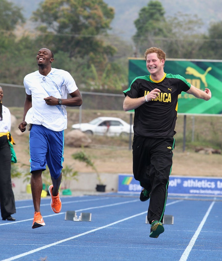 Prince Harry races Usain Bolt at the Usain Bolt Track at the University of the West Indies on March 6, 2012 in Kingston, Jamaica.