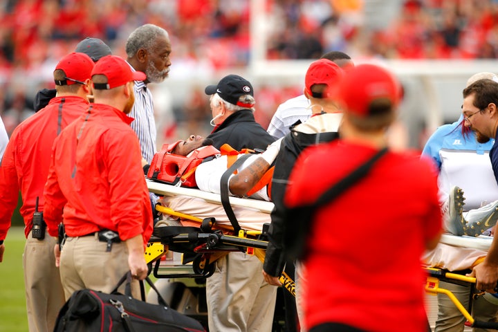 Devon Gales, shown as he is carted off the field on Sept. 26, 2015, is making progress after becoming paralyzed from the wais