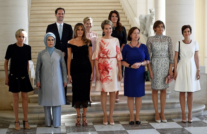 The spouses of NATO leaders gather for a photo before dinner at the Royal Castle in Laeken.