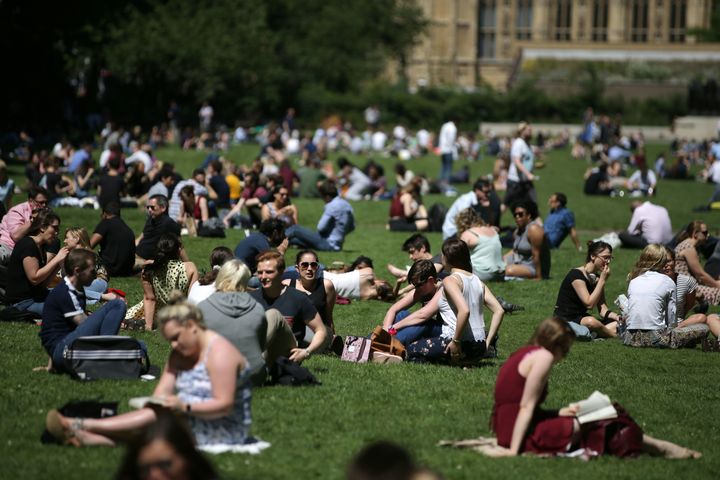 Workers ditch the office on Friday as sweltering conditions struck the capital