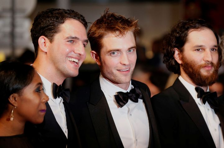 Robert Pattinson poses at the screening of