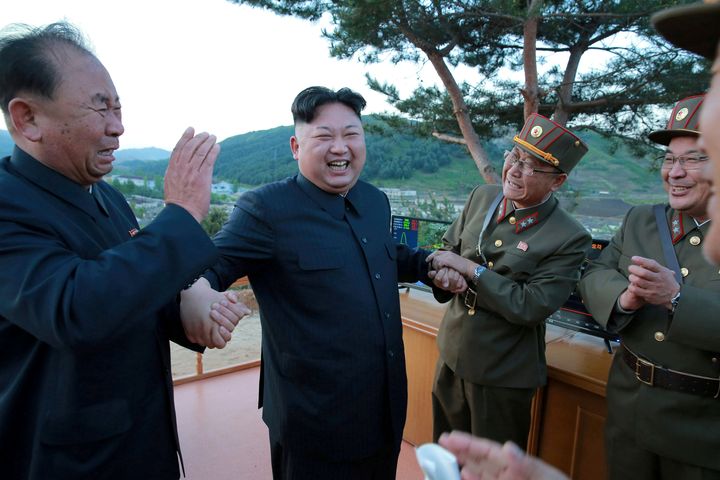 North Korean leader Kim Jong Un laughs with Ri Pyong Chol in this undated photo released by North Korea's Korean Central News Agency (KCNA) on May 15, 2017.
