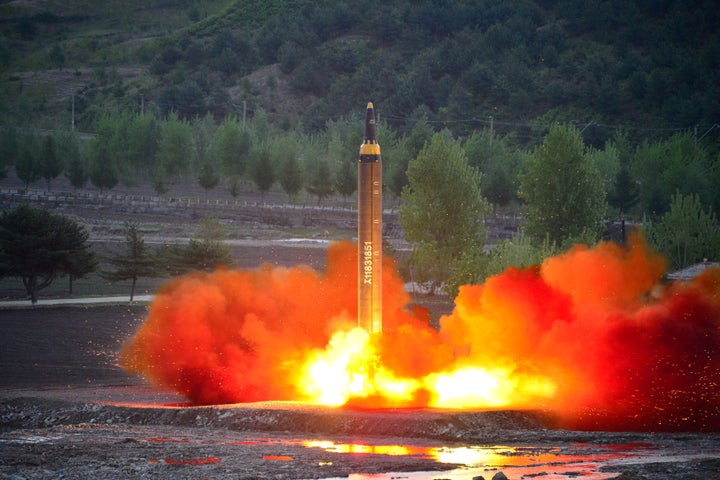 The long-range strategic ballistic rocket Hwasong-12 (Mars-12) is launched during a test in this undated photo released by No
