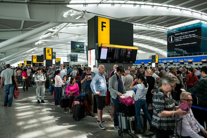 Passengers throng at BA's Heathrow terminal on Sunday as the IT glitch continued to cause havoc to travel plans