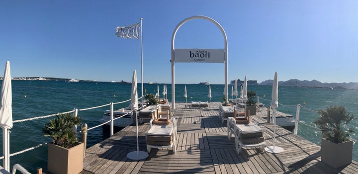 Work is done on the 'plage' - tents and jetties on the Mediterranean Sea