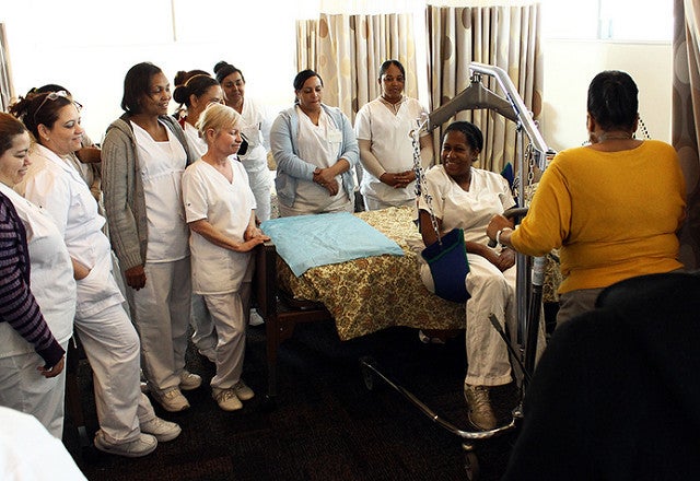 Home care workers at Cooperative Home Care Associates in New York City being trained by PHI, a national research and consulting nonprofit focused on the direct care workforce. 