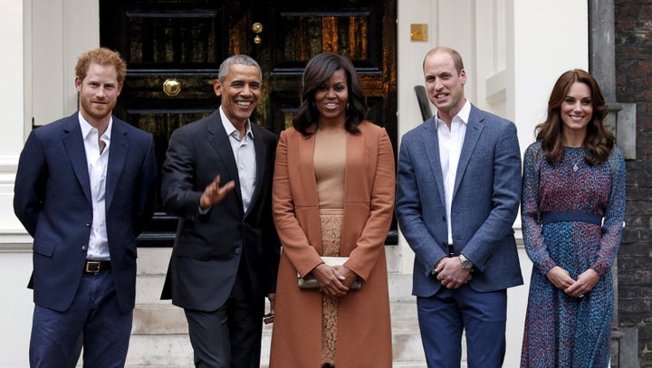 Former U.S. President Barack Obama and first lady Michelle Obama pose with Britain's Prince William, his wife Catherine, Duchess of Cambridge, and Prince Harry, upon arrival for dinner at Kensington Palace in London on April 22, 2016. 