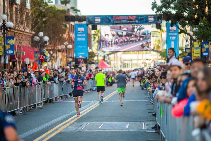 <p>Runners head toward the finish line at the San Diego Half-Marathon.</p>