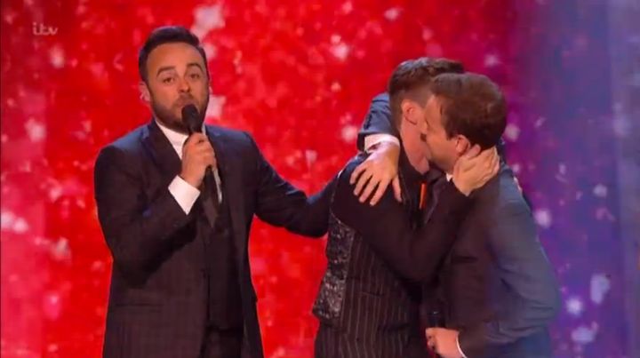 Matt celebrates with a very proud Ant and Dec