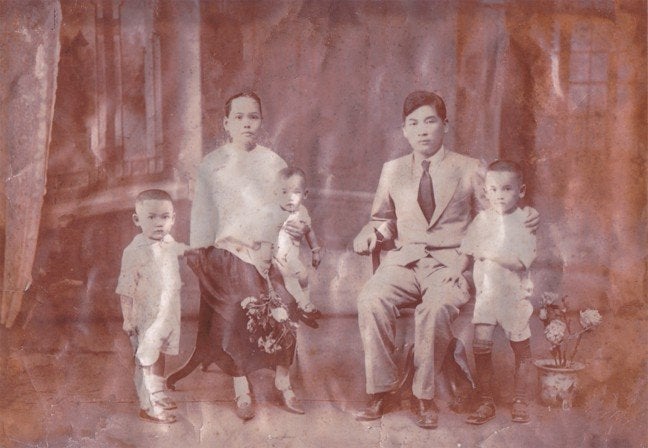 A Lowe Family portrait taken in China around 1929 featuring Samuel Lowe (Lowe Ding Chow), sons Chow Woo, Chow Kong and Chow Ying, and his wife, Ho Swee Yin.