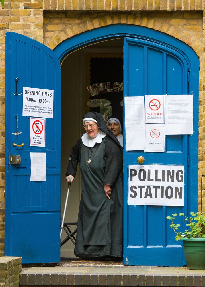 Having nun of it: Nuns leave after voting at a polling station at St John's Church in Paddington