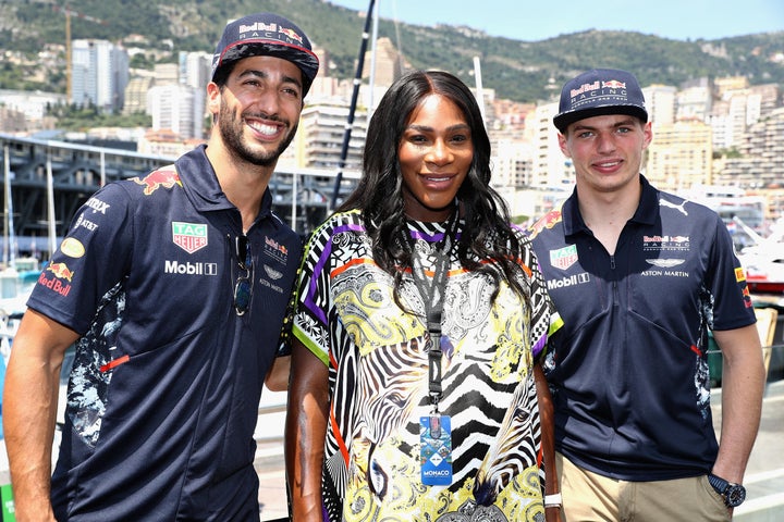 Tennis superstar Serena Williams with Daniel Ricciardo of Australia and Red Bull Racing and Max Verstappen of Netherlands and Red Bull Racing during the Monaco Formula One Grand Prix at Circuit de Monaco on May 28.