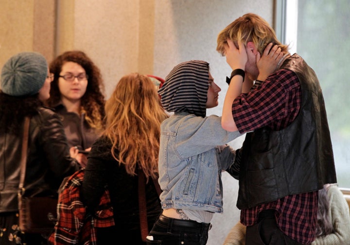 People react outside the courthouse during the May 30 arraignment of Jeremy Christian.