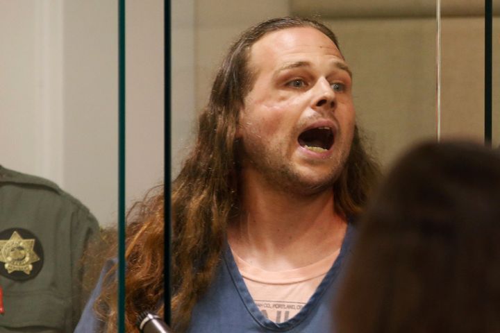 Jeremy Christian, accused of killing two men on a train, shouts in Multnomah County Circuit Court in Portland on May 30.