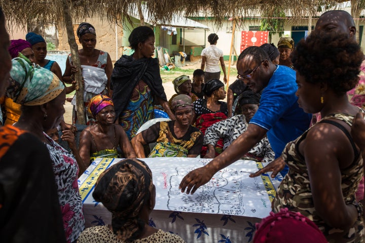 <p>Villagers map the extent of child trafficking in their community, a first step in building a coordinated, community-led effort to build resistence to modern slavery.</p>