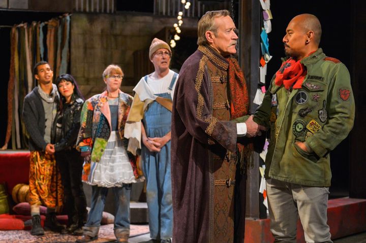 James Carpenter (Duke) bids farewell to Jacques (Jomar Tagatac) in a scene from As You Like It 