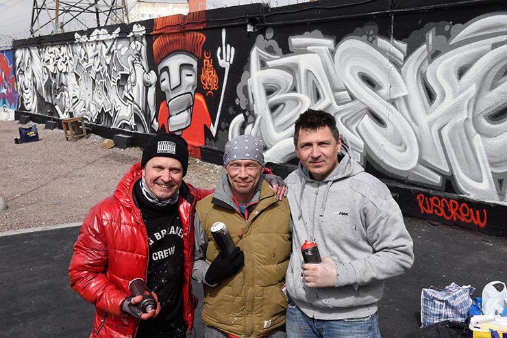 From left to right: Vadim Krys (Lithuania), Basket (Russia) and Max Navigator (Russia). First Wave of Graffiti in USSR at the Street Art Museum. Saint Petersburg, Russia. May 2017. (photo © Martha Cooper)Krys has been doing graffiti since 1985 and is one of the pioneers of graffiti in the Soviet Union. He was inspired when he first saw the American documentary “Hip Hop and Its History” when he was 14 years old. Basket and Max are also pioneers of graffiti in the USSR.
