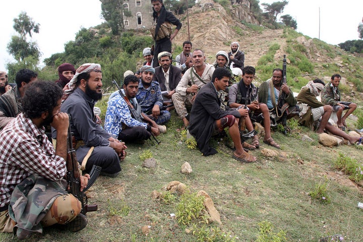 Fighters in Yemen work with an Iran-allied Houthi militia in Taiz province on July 28 2016.