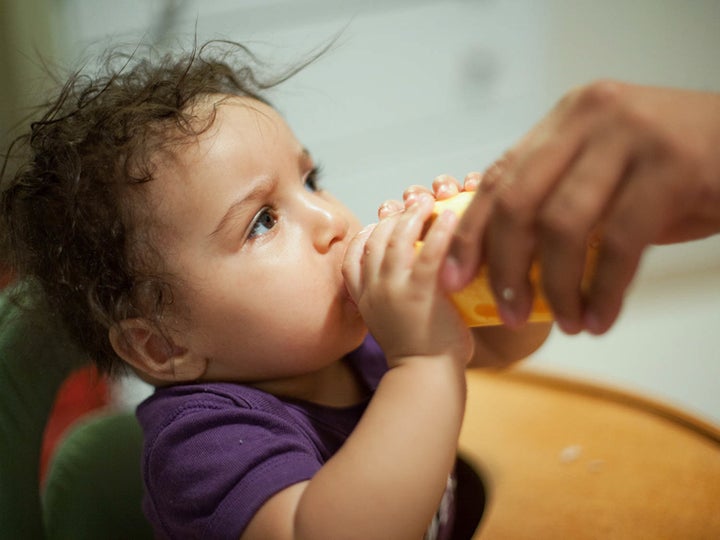 "Evening feeding with Daddy, 2014."