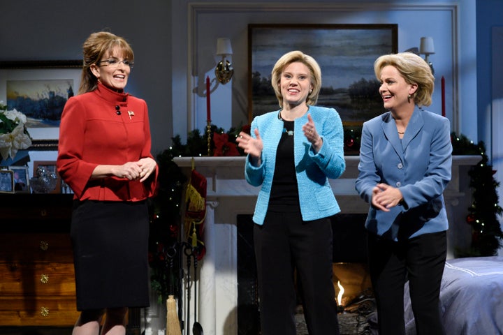 Tina Fey, as Sarah Palin, stands beside Kate McKinnon and Amy Poehler, both portraying Hillary Clinton, on Dec. 19, 2015.