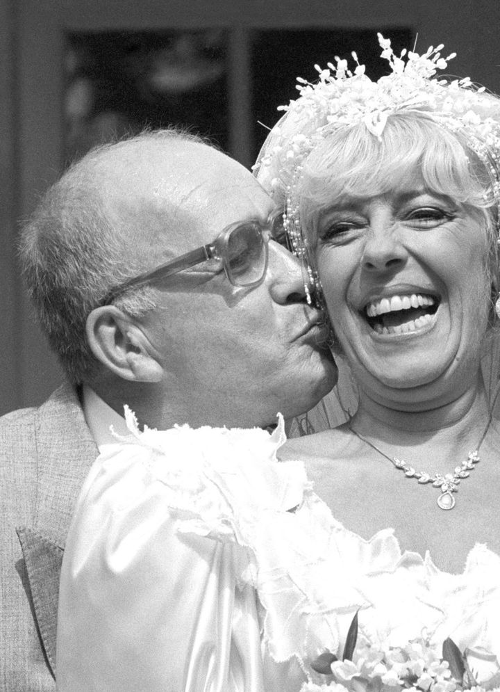 Roy and Julie on their characters' wedding day in 1987