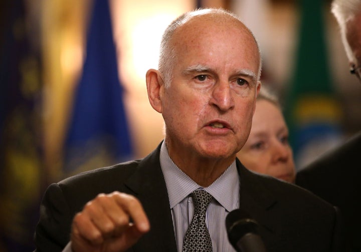 Brown speaks during the signing of a first-of-its-kind agreement with leaders from 11 states and global provinces to limit the increase in global average temperature to below 2 degrees Celsius. May 19, 2015, Sacramento.