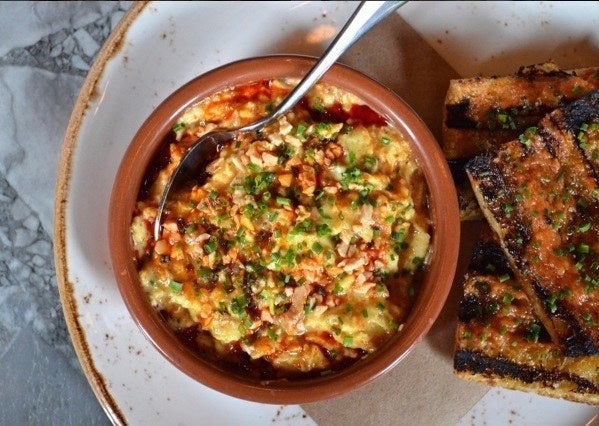 <p>Flay's romesco and scallion scramble at NYC's Gato</p>
