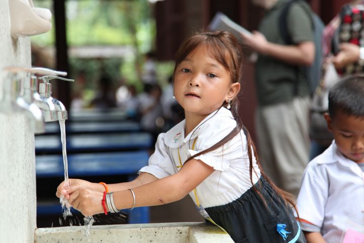 The school meal program provided by Caring for Cambodia (CFC) also teaches students to stay healthy by instilling the habit of washing their hands with soap before and after eating.