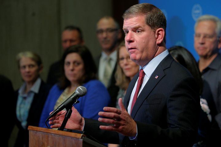Boston Mayor Marty Walsh tries to persuade President Donald Trump not to withdraw from the Paris climate accord during a news conference Wednesday. He's one of the signers of Thursday's open letter.