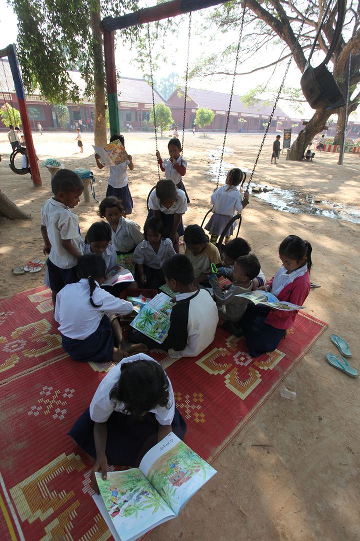Students also can swing on the playground next to students who are reading. Location: Bakong Motwani Junior High School, Siem Reap. 