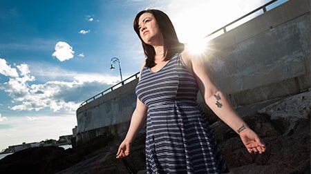 Clare at her photo shoot for the Deconstructing Stigma exhibit at Boston Logan Airport