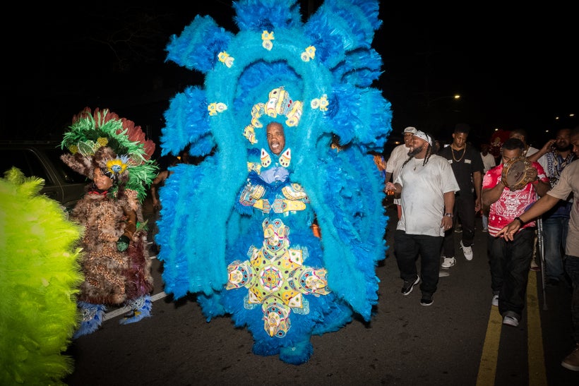 Big Chief Darryl Montana of the Yellow Pocahontas Black Masking Indian Tribe begins his final Carnival walk as he prepares to