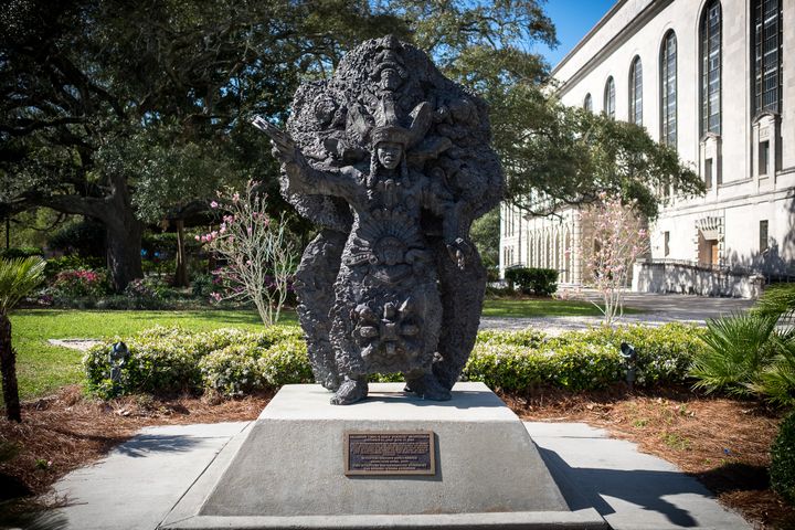 A statue of Allison “Tootie” Montana sits in Congo Square within Louis Armstrong Park in New Orleans.