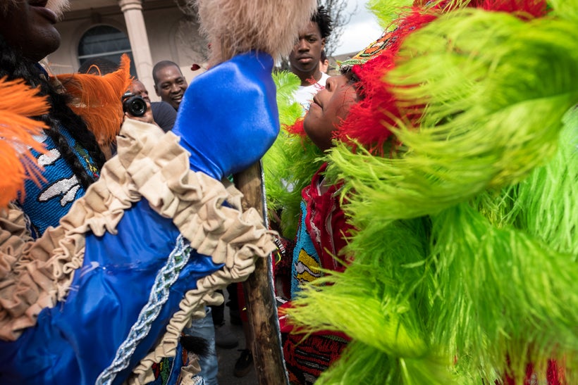 A young spyboy, right, attempts to battle with an opposing tribe’s Wildman, left.