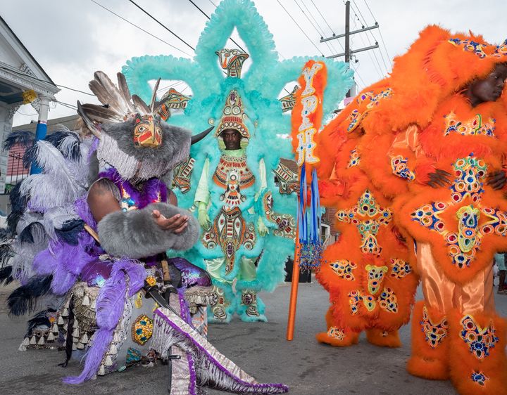 Shaka Zulu stands with his tribe’s Wildman, flagboy, and spyboy on the street in front of Joyce Montana’s house on Carnival Day, February 28, 2017. 