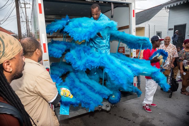 Darryl Montana arrives in front of his mother’s house in the Tremé neighborhood of New Orleans on Carnival Day, February 28, 2017. His triple-layered crownpiece is so big it requires a Uhaul truck to transport it. 