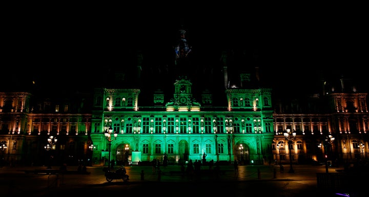 A picture taken Thursday shows the city hall of Paris illuminated in green following Trump's announcement that the United States will withdraw from the 2015 Paris accord.