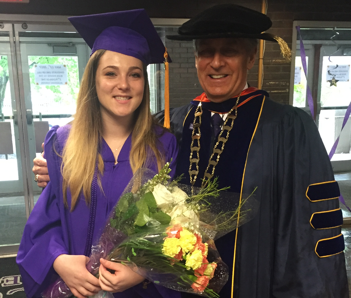 <p>Annie FitzPatrick congratulated by Harcum College President, Dr. Jon Jay DeTemple.</p>